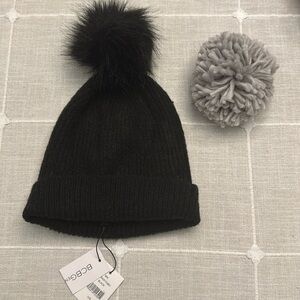 BCBG winter hat with interchangeable Pom Poms. NWT